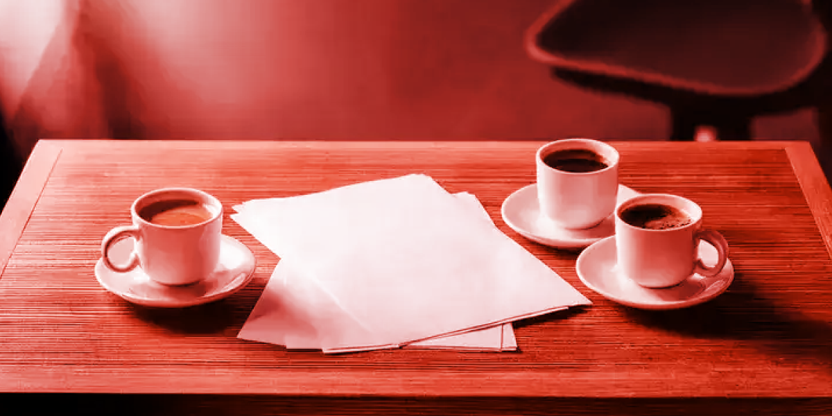 Coffee cups on a red hue 