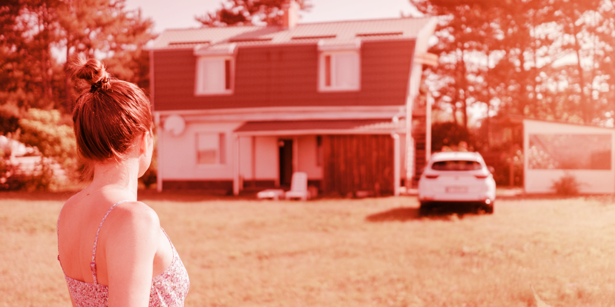 Woman looking at her first-home, red brand overlay
